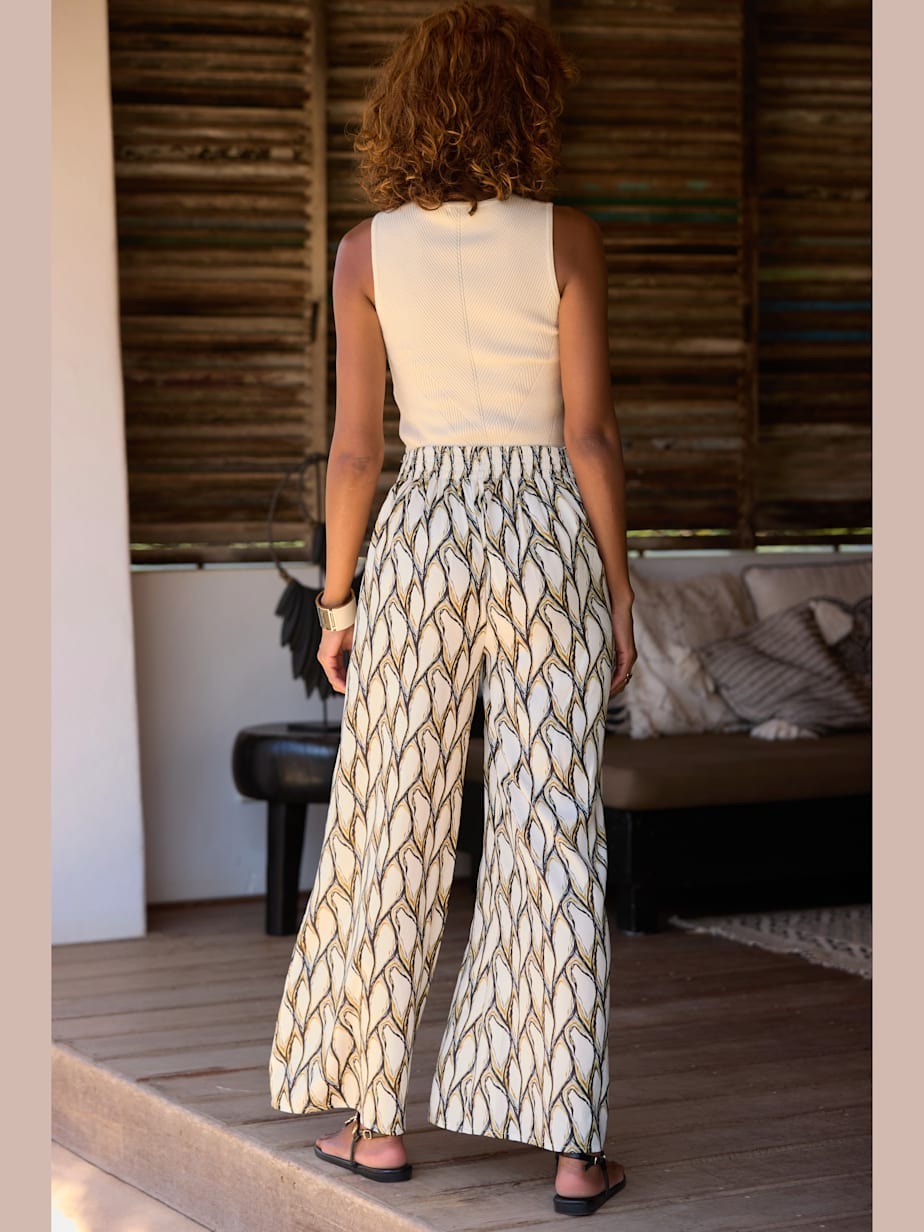 Pantalon large à poches en satin légèrement brillant