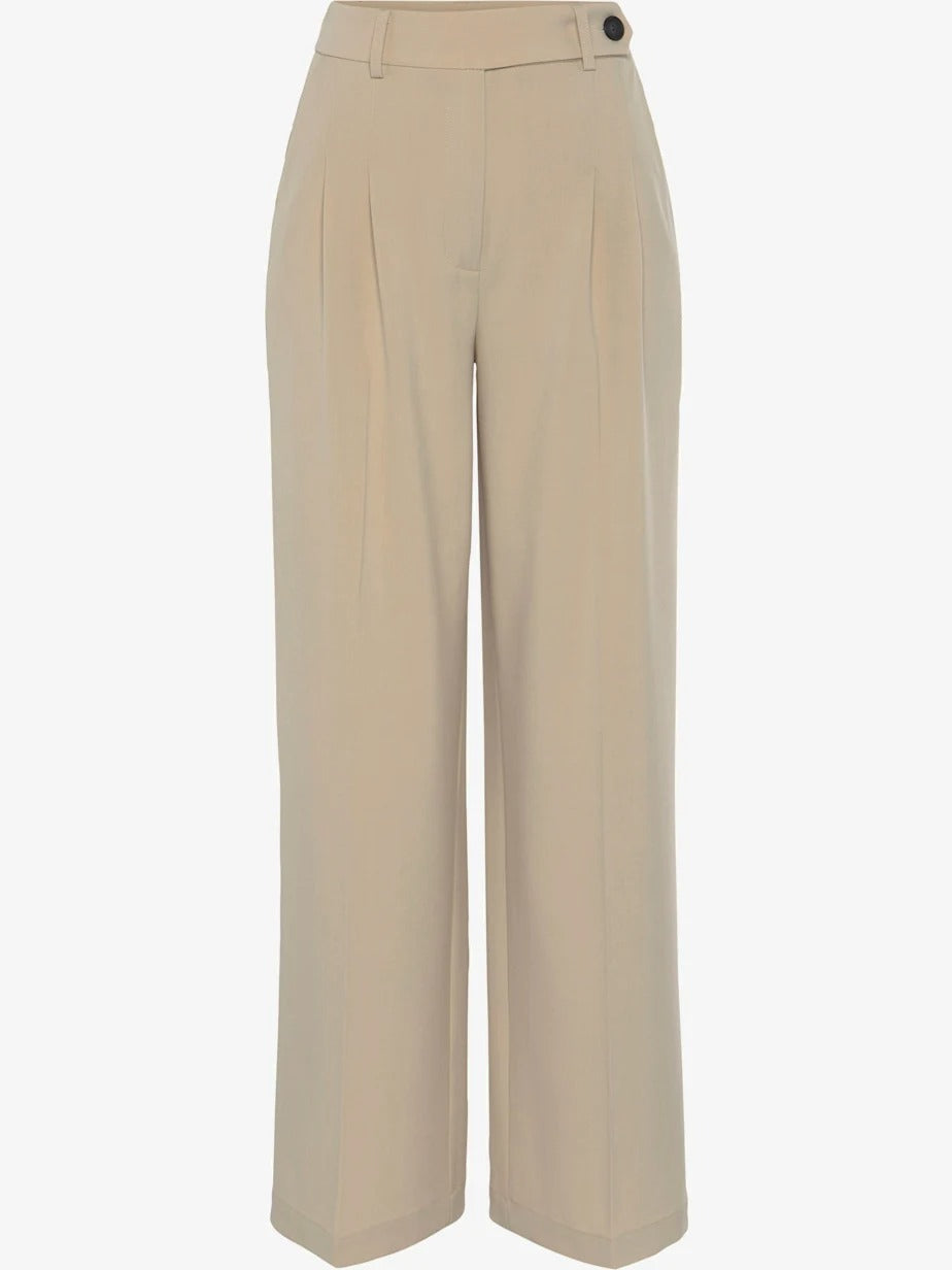 Pantalon large avec pinces et poches pratiques devant