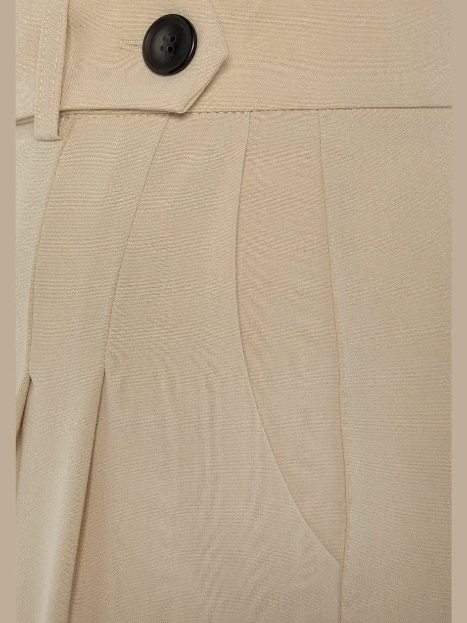 Pantalon large avec pinces et poches pratiques devant